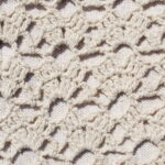 Essa manta artesanal com folhas tropicais está conquistando os corações das crocheteiras