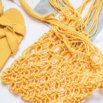 Bolsa de crochê estilo praia com fio de algodão areia e acabamento resistente