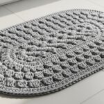 Tapete de banheiro em crochê oval para segurança e charme