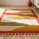 Iniciantes estão fazendo esse tapete de crochê com sobras de barbante e o resultado parece peça de decorador