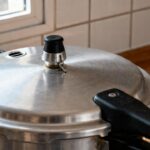 Para que serve a pequena abertura na tampa das panelas de pressão novas